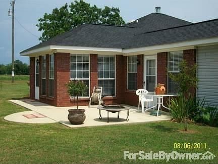 House Back
						:
						Patio outside of sunroom