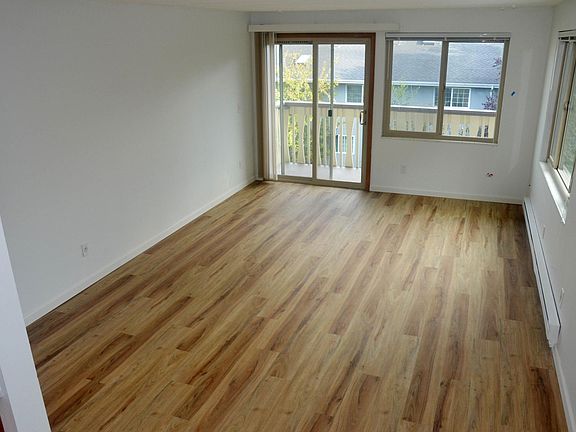 Spacious living room with 4 ft. x 12 ft balcony