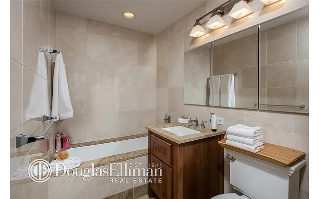 Sold by Douglas Elliman | media 19