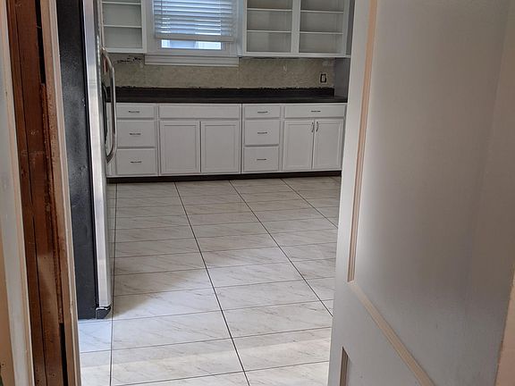 Looking from bathroom to kitchen