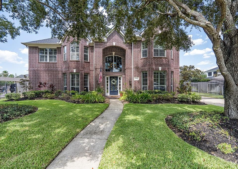 Welcome home to 15726 Lake Loop Drive in the master planned community of Fairfield!