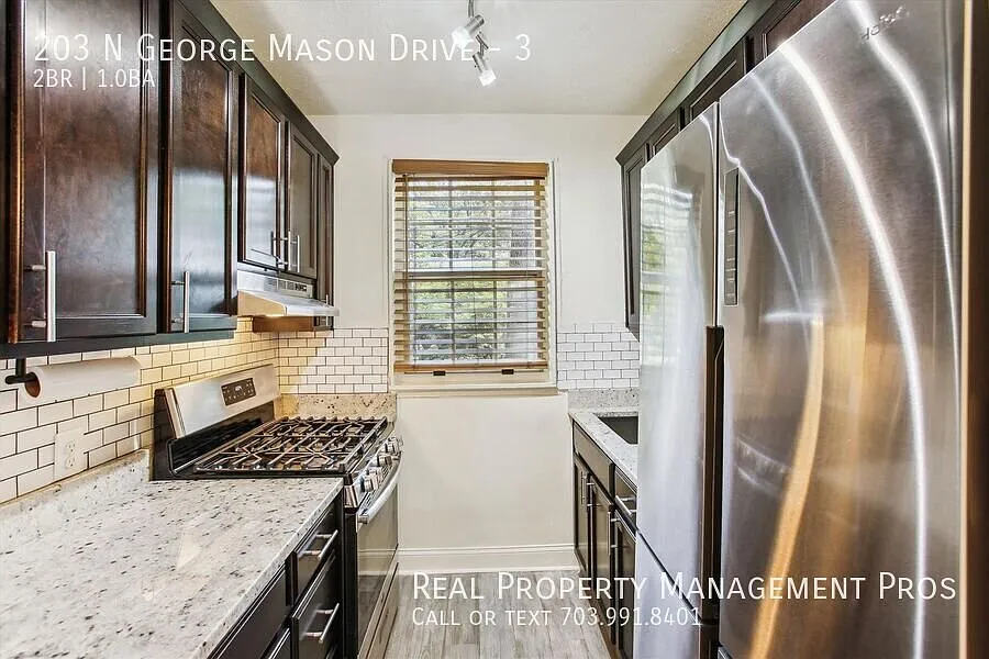 2 bedroom condo + dedicated storage & FULL Washer and dryer in unit! — Photo 3