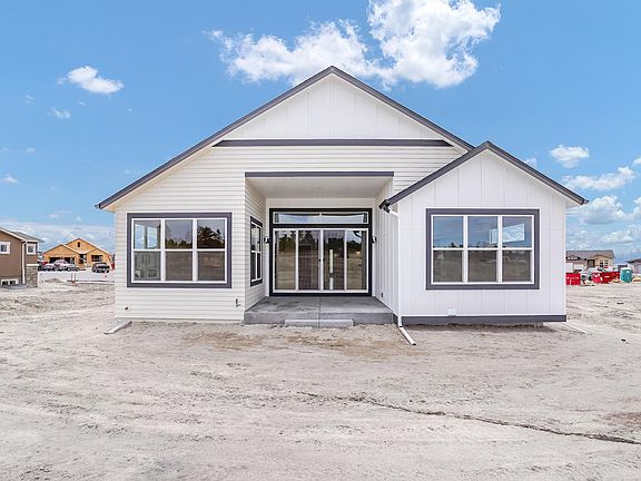 Rear Exterior. Photo representing home to be built and may demonstrate optional features