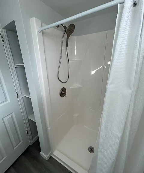 Lower level shower and tall closet