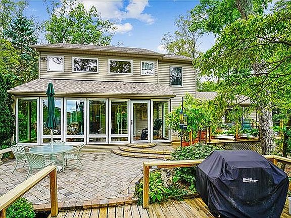 Rear view shows Sunroom