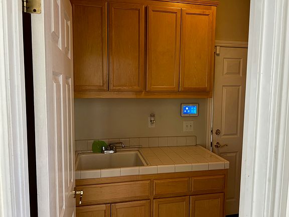 Laundry room sink and cabinets
