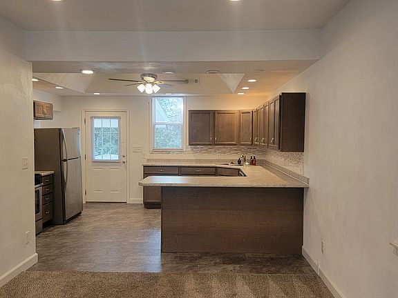 Kitchen has newer cabinets & countertop & flooring.