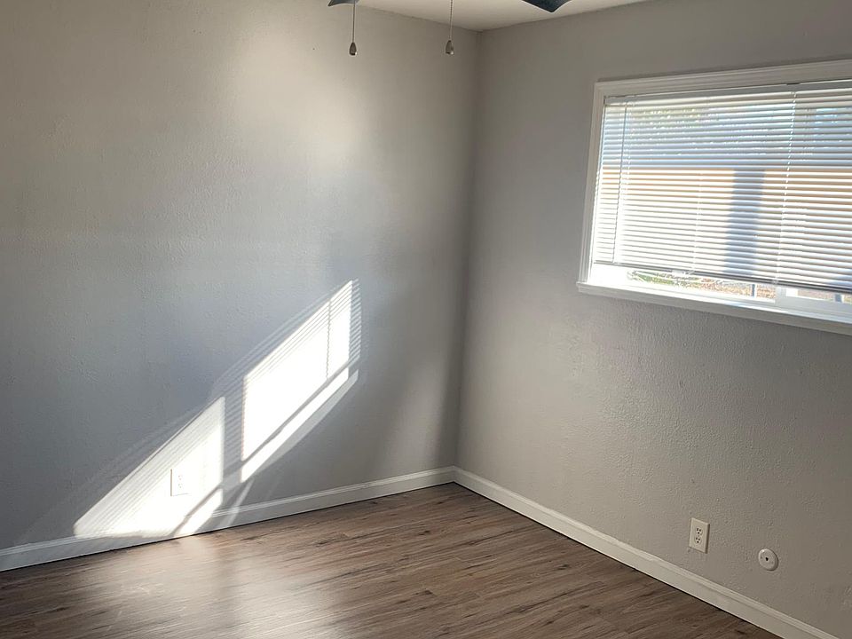 Bedroom with new fan & blinds