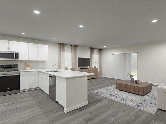 Choose from homes with warm wood or classic white finishes - Daisy townhome by Highland Homes Artis
