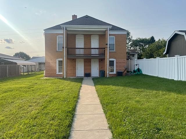 Entire left side is unit B. also grassy backyard
