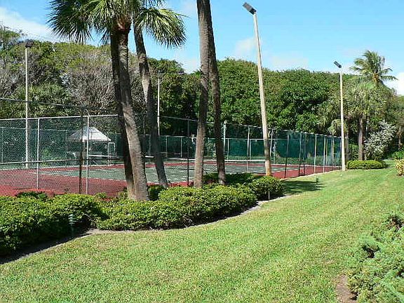 Three lighted tennis courts
