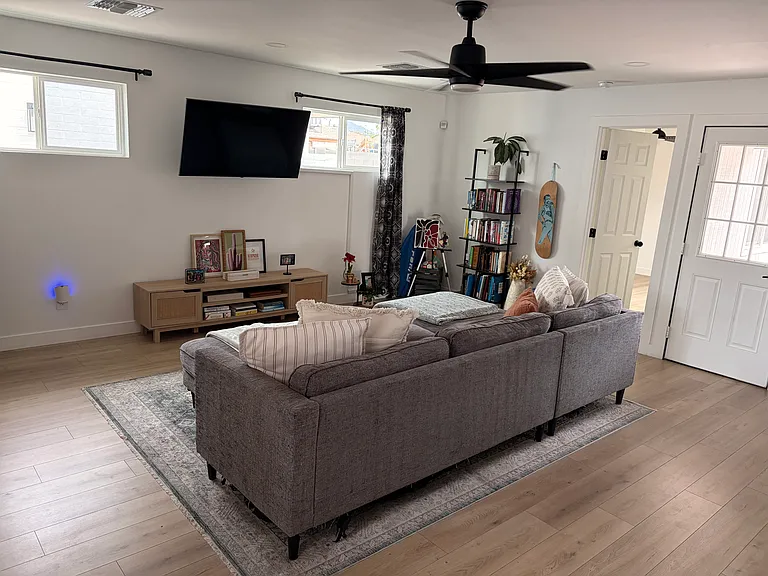 Main Living Room that Room for Rent connects to. And connects to two outdoor patios.