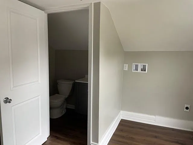 Half bathroom and hooks ups for laundry.