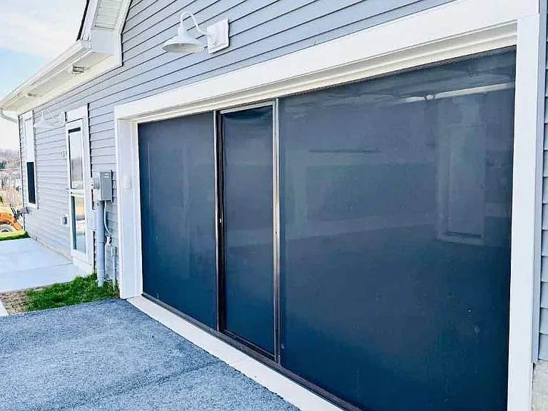 169 Coastal Drive - Garage Exterior w/ Screen Down