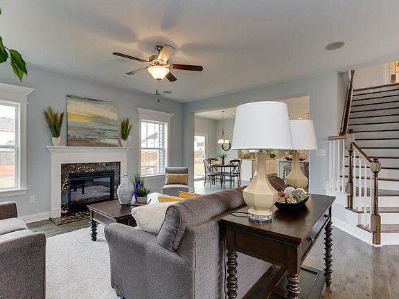 Great Room looking towards breakfast area and kitchen.  Photo shown similar to home being built.