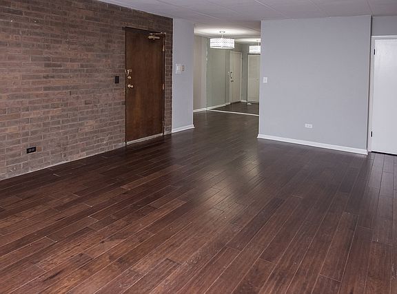 4-Living Room with main entrance towards kitchen and second entrance door