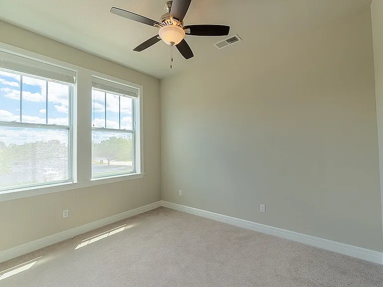 Bedroom with Large Windows