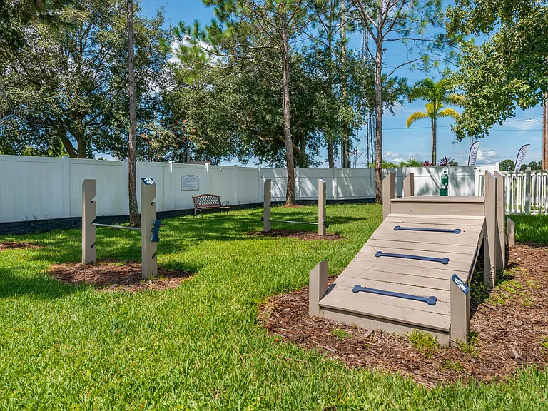 Let your pets run free in the off-leash dog park at Soleil Blu Apartments in St Cloud, FL. Featuring agility equipment, shaded seating, and plenty of space for your pets to enjoy outdoor exercise in a secure environment.