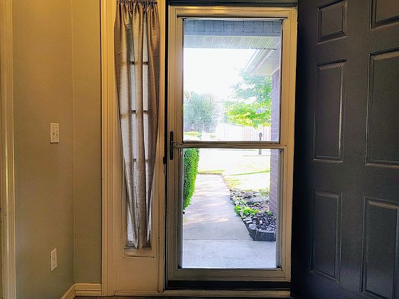 Front entryway with storm door