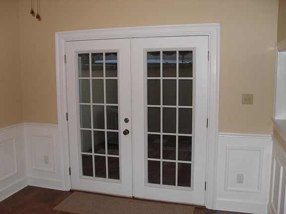 Dining Room French Doors Open Out to Patio