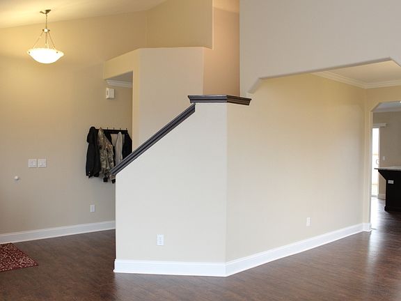 Vaulted ceilings greet you