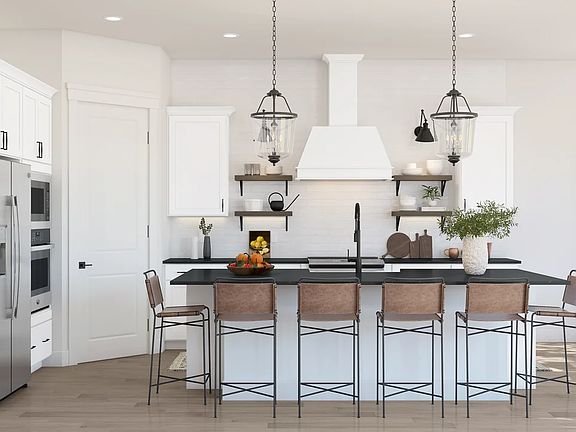 Kitchen with pendant lighting and floating shelves