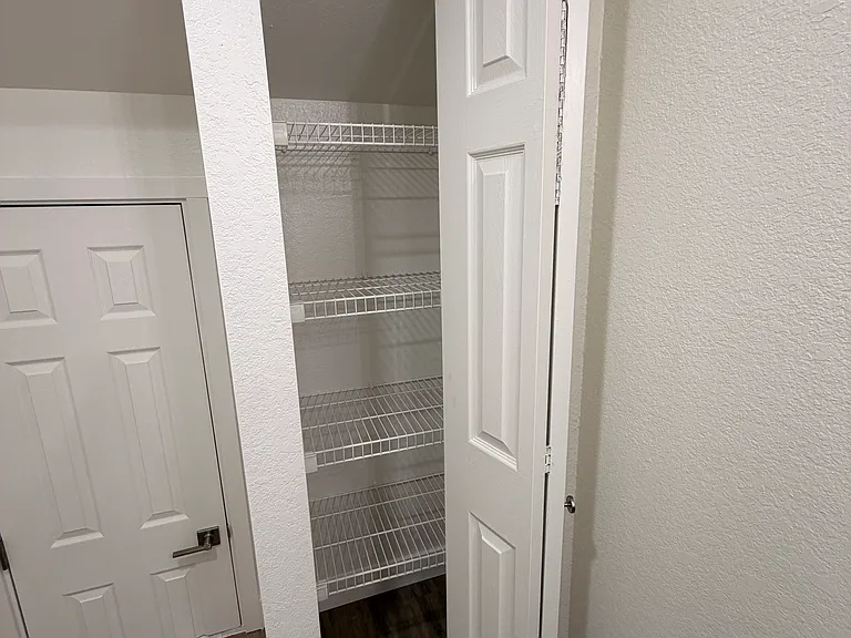 Linen closet in primary bathroom