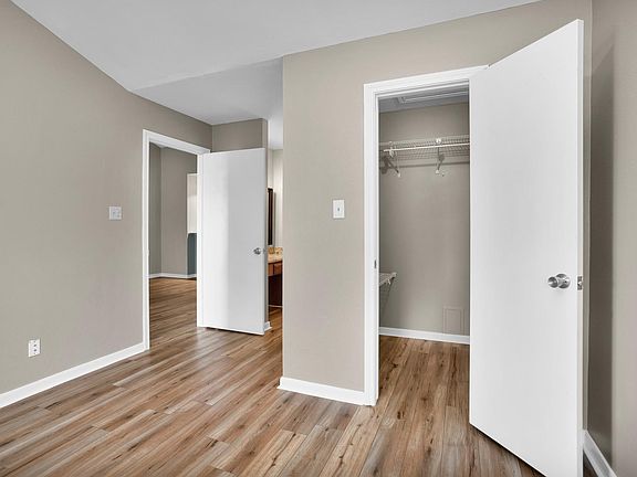 NOTICE THE NEWLY PAINTED CONDO WITH UPDATED DESIGNER GRANITE IN KITCHEN AND BATHROOMS