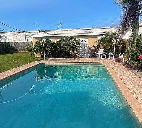 pool area facing cottage
