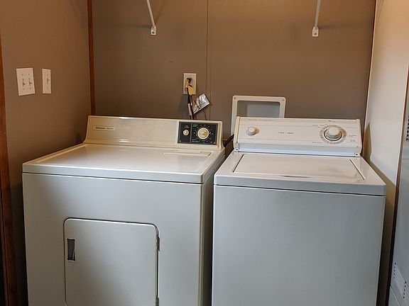 Front entryway. Washer and dryer.