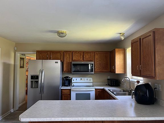 4th image of 613 John Sutherland Dr