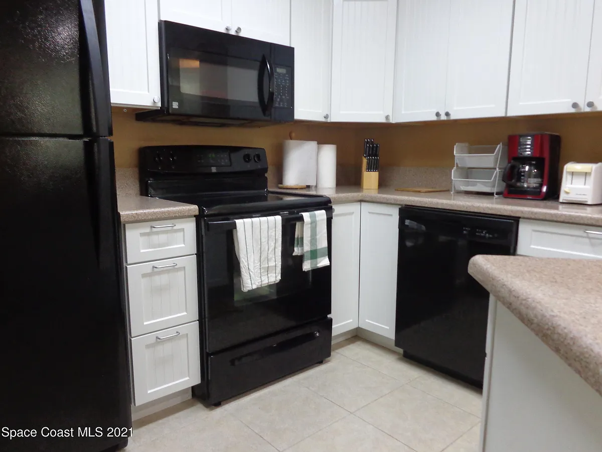 Building Photo - 8401 N Atlantic Ave #F5