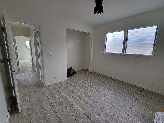 Bedroom unfunished before fan was installed