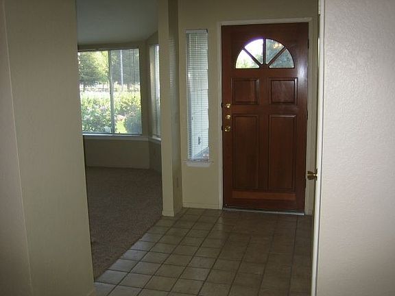 Front enterance with the Livingroom just off entry.