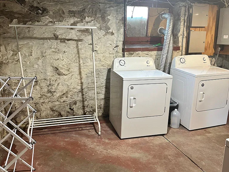 Basement laundry, separate washer/dryer for 1st and 2nd floor units