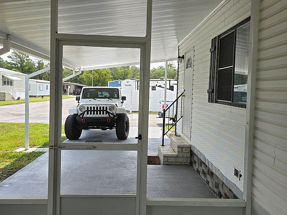 Carport screened in porch