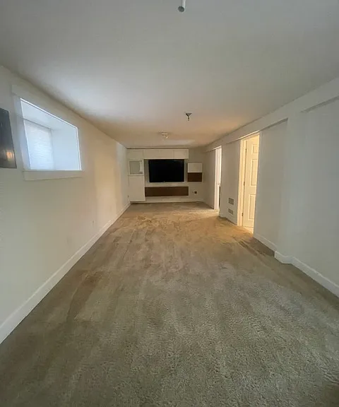 large living room that connect to the kitchen