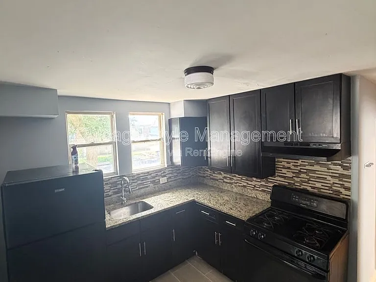 8756 S Exchange Ave #1F — Photo 1