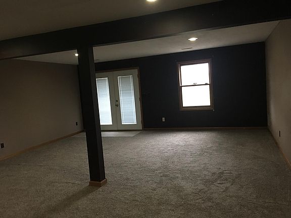 Downstairs walk out basement, family or bonus room.