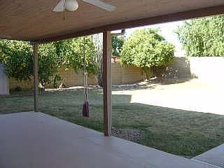 Large backyard with grass