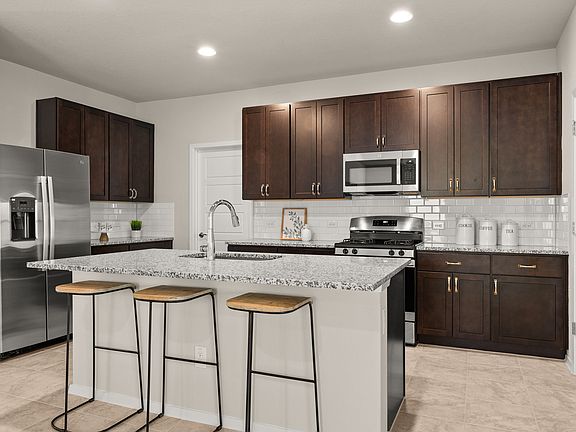 Breakfast bar provides additional eating and prep space