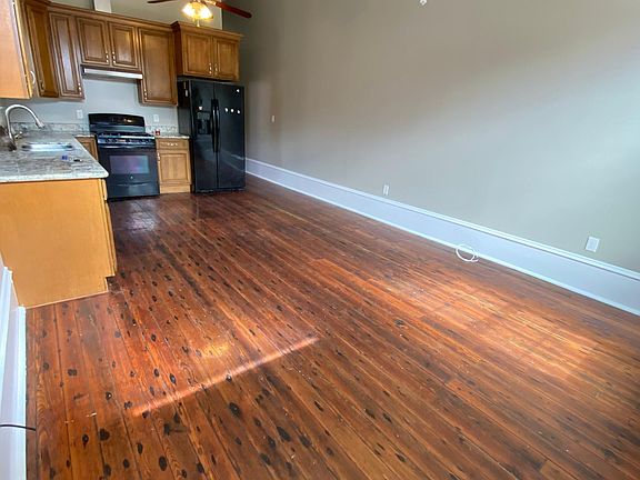 Greta open floor plan with beautiful wood floors.