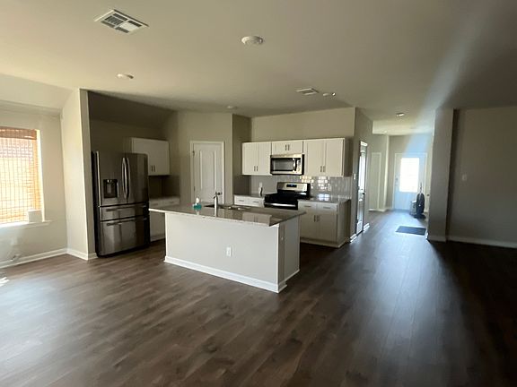 Spacious TV lounge and Kitchen Area
