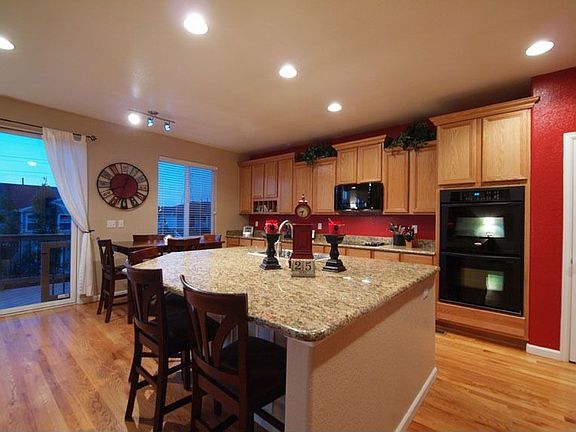 Hardwood Floors, Granite Slab in Roomy Kitchen