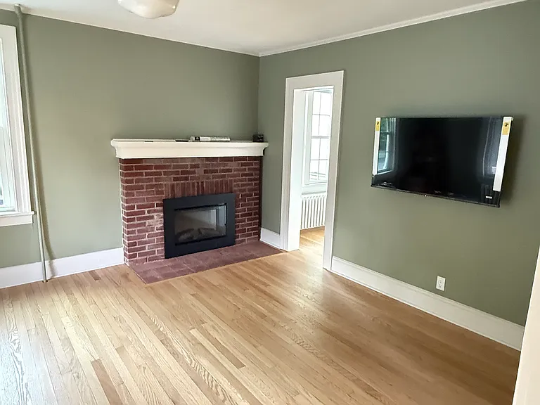 Living room. Small office to the right of the fireplace.