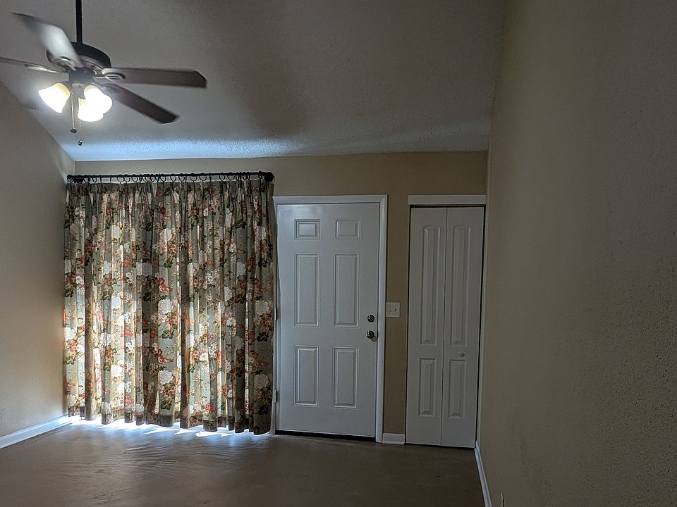 Front Room - Sliding Door, Entry Door & Closet