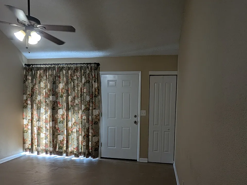 Front Room - Sliding Door, Entry Door & Closet