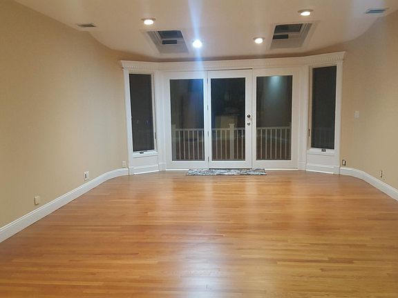 View of living room with skylights