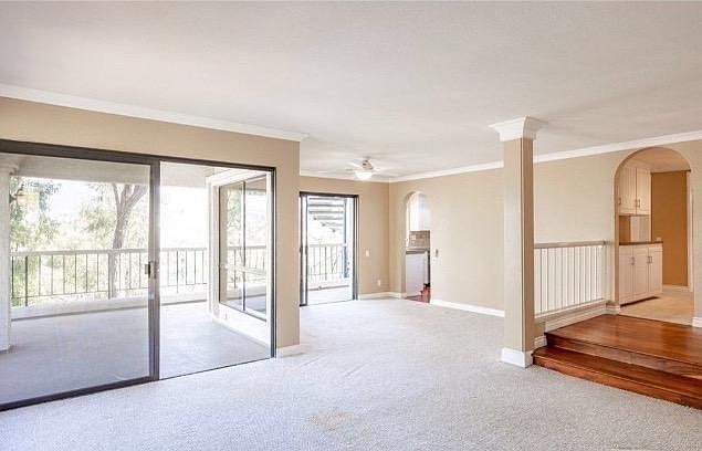 Family room, dining room with two sliders to large wrap around deck!