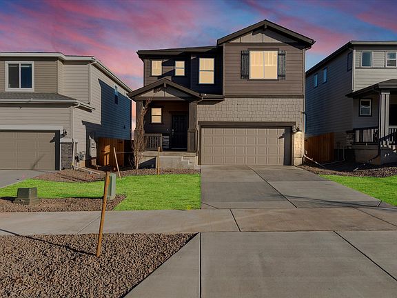 The Red Rock floorplan exterior image taken at a Meritage Homes community in Northern Colorado.